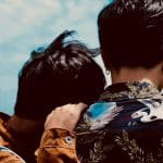 two boy's looking at sky